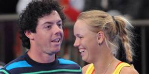 Den nykårede verdensetter i golf Rory Mcilroy var i højt humør i det fine selskab.