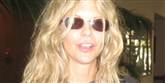 <span style='font-family: Arial; font-size: 15px; color: White;'>Selv med morgenrodet hår og paparazzier i ansigtet er skuespillerinden Meg Ryan bjergtagende. Det syntes People Magazine også i 1994, hvor French Kiss-stjernen overstrålede al konkurrence.</span> <span style='font-family: Arial; font-weight: normal; font-size: 15px; color: #999999;'>Foto: Flickr</span>