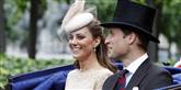 <span style='font-family: Arial; font-size: 15px; color: White;'>Det var en stor dag for både det britiske kongehus og det britiske folk, da prins William for lidt over et år siden giftede sig med billedskønne og elegante Kate Middleton, der nu er hertuginde af Cambridge.</span> <span style='font-family: Arial; font-weight: normal; font-size: 15px; color: #999999;'>Foto: PETER BYRNE / POLFOTO</span>
