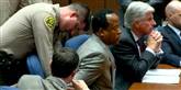 <span style='font-family: Arial; font-size: 15px; color: White;'>Jacksons læge, Conrad Murray, blev idømt fire års fængsel for utilsigtet manddrab. Obduktionsrapporten viste, at popkongen var blevet dræb af en overdosis af bedøvelsesmidlet Propofol.</span> <span style='font-family: Arial; font-weight: normal; font-size: 15px; color: #999999;'>Foto: AP / POLFOTO</span>