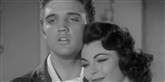 <span style='font-family: Arial; font-size: 15px; color: White;'>Elvis Presley var ikke alene en verdensstjerne på alverdens musikscener, charmøren havde også en flot film-karriere. Han døde 42 år gammel i 1977, svært overvægtig og ødelagt af diverse piller. Han efterlod sig skuespiller-konen Priscilla Presley og datteren Lisa Marie Presley.</span> <span style='font-family: Arial; font-weight: normal; font-size: 15px; color: #999999;'>Foto: Trailer screenshot/wikimedia</span>