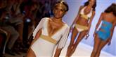 <span style='font-family: Arial; font-size: 15px; color: White;'>Det flotte modeshow foregik ved Miami Beach.</span> <span style='font-family: Arial; font-weight: normal; font-size: 15px; color: #999999;'>Foto: AP Photo/J Pat Carter / POLFOTO</span>