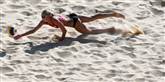 <span style='font-family: Arial; font-size: 15px; color: White;'>Beachvolley-konkurrencen er også undervejs. Uden dansk deltagelse. Leveret af Newspaq.</span> <span style='font-family: Arial; font-weight: normal; font-size: 15px; color: #999999;'>Foto: Ap / POLFOTO</span>