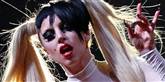 <span style='font-family: Arial; font-size: 15px; color: White;'>Lady Gaga komponerer selv sin musik og sine tekster. Hun designer sine kostumer og laver sin egen koreografi til musikvideoer og optrædener.</span> <span style='font-family: Arial; font-weight: normal; font-size: 15px; color: #999999;'>Foto: POLFOTO/AP/Francois Mori</span>