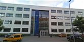 <span style='font-family: Arial; font-size: 15px; color: White;'>Bronzepladsen indtages af Aalborg Handelsskole. Lærerne (ialt 173) fik her udbetalt knap 80.000 kroner hver i overtidsbetaling i 2010.</span> <span style='font-family: Arial; font-weight: normal; font-size: 15px; color: #999999;'>Foto: Google Maps</span>