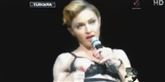 <span style='font-family: Arial; font-size: 15px; color: White;'>Det er ikke længe siden kritikken haglede ned over superstjernen Madonna, efter hun viste sin ene brystvorte under en koncert i Istanbul.</span> <span style='font-family: Arial; font-weight: normal; font-size: 15px; color: #999999;'>Foto: Screendump fra YouTube</span>