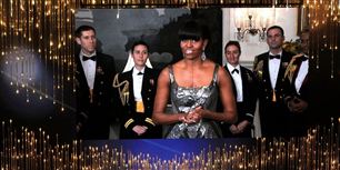 USA's førstedame var iført en smuk sølvfarvet, glitrende og ærmeløs kjole, da hun søndag - via et signal fra Det Hvide Hus - overrakte prisen for årets bedste film ved den årlige Oscarfest. Men kjolen var lidt for vovet til iransk tv.