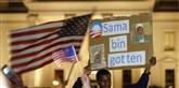 <span style='font-family: Arial; font-size: 15px; color: White;'>Med bl.a. et O fra Obamas valgkamp har en ung mand foran Det Hvide Hus lavet et skilt med teksten: Osama bin Fanget.</span> <span style='font-family: Arial; font-weight: normal; font-size: 15px; color: #999999;'>Foto: AP / POLFOTO</span>