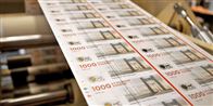 Stribevis af 1000 krone-sedler på vej ud af seddelpressen i Nationalbanken.