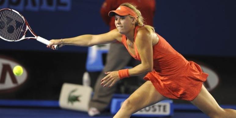 Orange held og dygtighed. Wozniacki gør en flot figur under Australian Open.