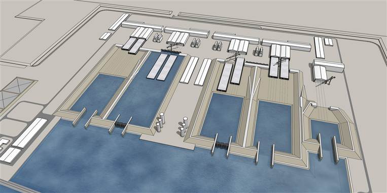 I denne specialbyggede fabrikshavn ved Rødby Havn skal de over 200 meter lang tunnelelementer støbes. 2.000-3.000 mand får job her.&nbsp;