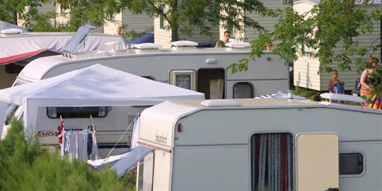 En uge mindre på campingpladsen. Det er virkelighed for mange HK'ere, som presses til at droppe den 6. ferieuge pga. arbejdspres.