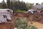 Et kæmpe mudderskred og ødelagte huse