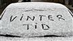 bilrude med vintertid skrevet i sne