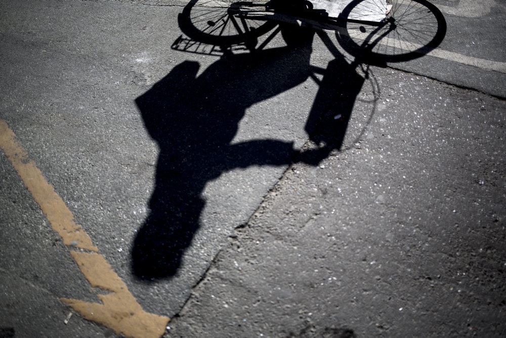 En skygge/silhouet af en cyklist