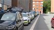 Politibiler på række på gade i Aarhus