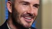Billede af en bredt smilende David Beckham
