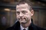 Morten Østergaard iført jakke foran retten på frederiksberg