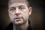 Nærbillede af Morten Østergaard med en meget alvorlig mine. 