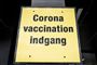 skilt ved indgang til coronavaccination