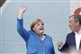 Merkel vinker