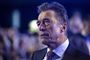 anders fogh iført jakke og slips