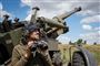ukrainske soldater ved en kampvogn