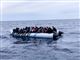 En gummibåd med migranter