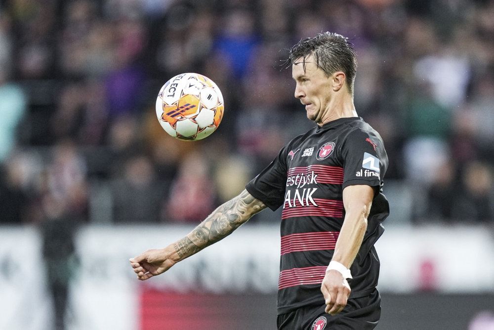 fodboldspillere i aktion