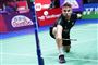 badmintonspiller i aktion