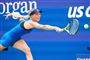 tennisspiller i aktion på banen