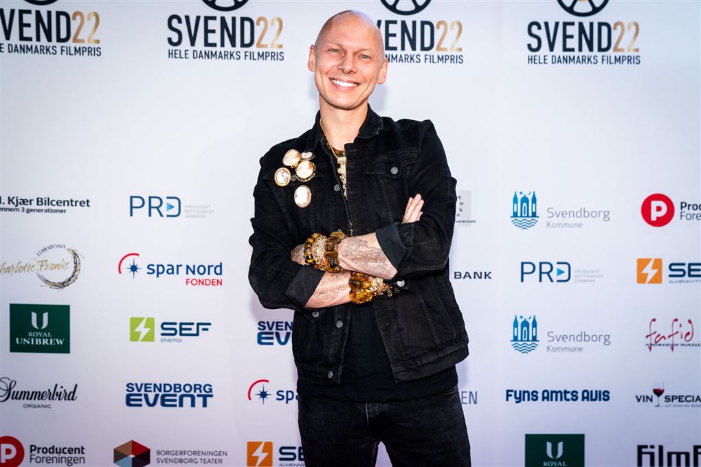 Jim Lyndvild med stort smil og armene over kors.