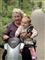 En ældre dame på en scooter.