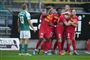 fodboldspillere i aktion