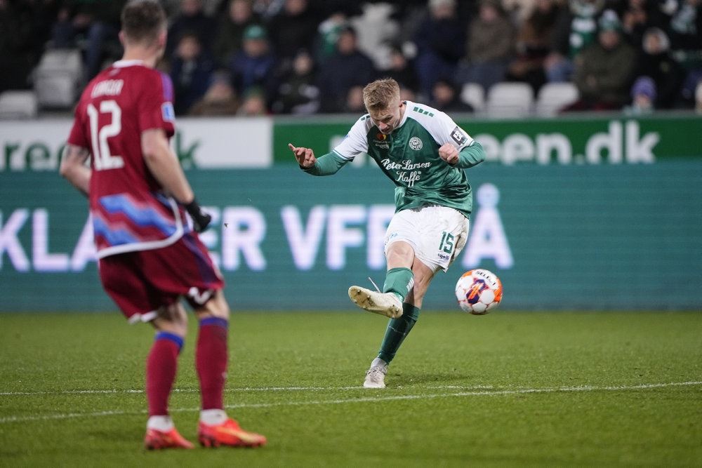 fodboldspillere i aktion