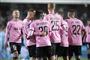 fodboldspillere i aktion