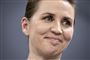 Mette Frederiksen smiler