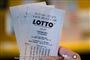 Flere lottokuponer i en hånd