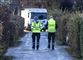betjente og en af politiets vogne