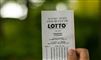 person holder lotto-kupon