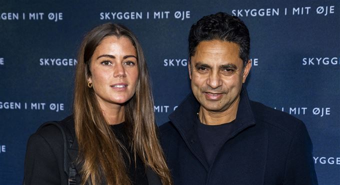 et par smiler til fotografen