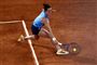 kvindelig tennisspiller på grusbane