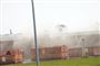bygninger og containere i brand