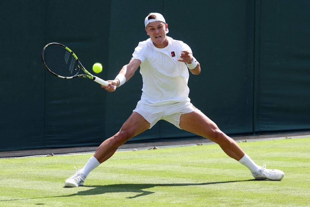 tennisspiller i aktion
