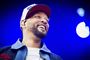 Will Smith smiler fra en scene
