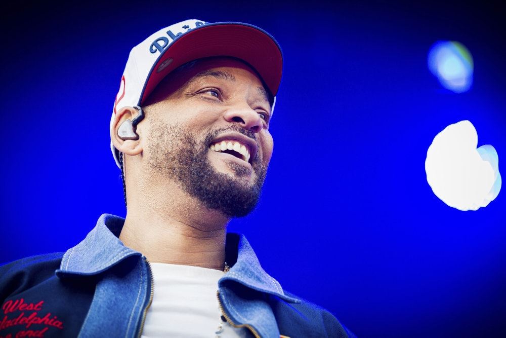 Will Smith smiler fra en scene